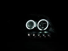 Load image into Gallery viewer, ANZO 1997-2003 Ford F-150 Projector Headlights w/ Halo Black (CCFL)